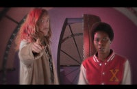 a man and a woman standing next to each other